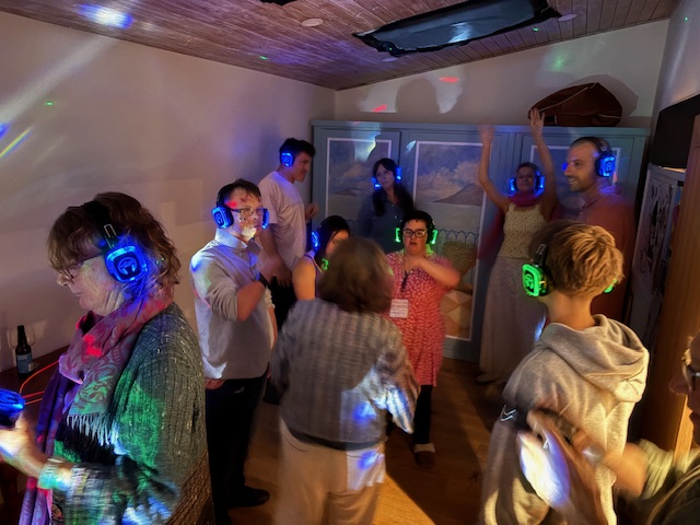 People enjoying a silent disco in their house
